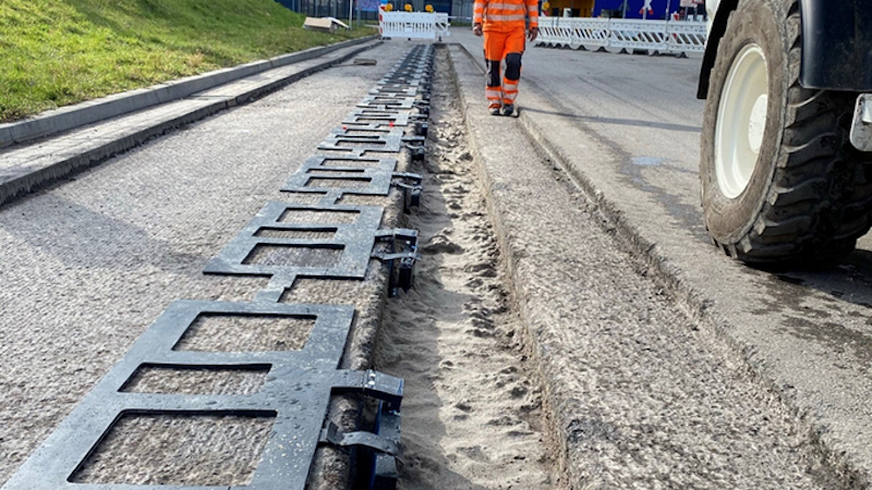 This system is intended to charge e-buses while driving