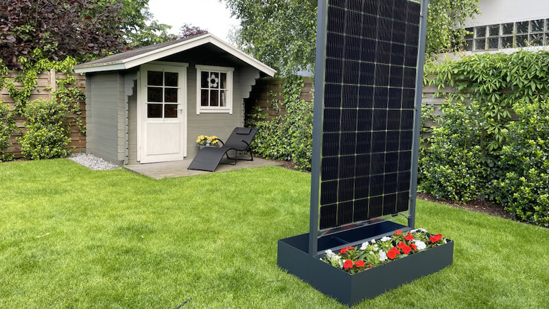 This solar flower pot is a privacy screen and solar system at the same time