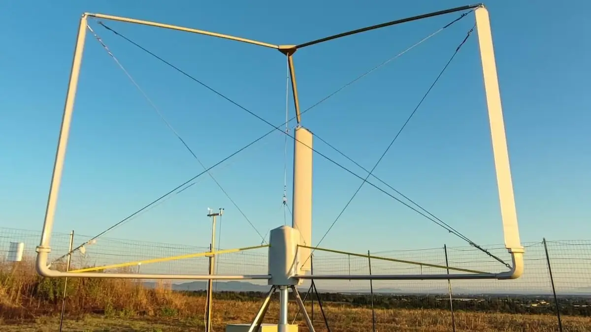 Vertikales Windrad Stadt Dächer KI Haus